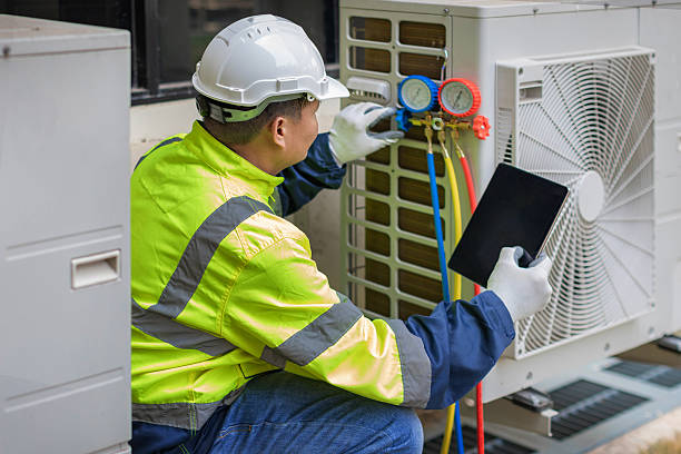 Professional Heat Pump Repair technician working in Marion, VA